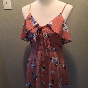 Excellent condition romper with blue flowers